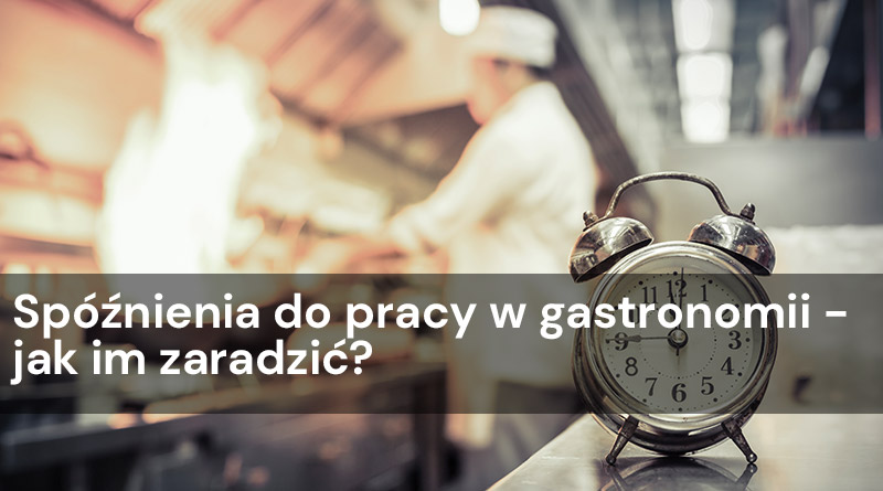 zegar na pierwszym planie z kucharzem w tle